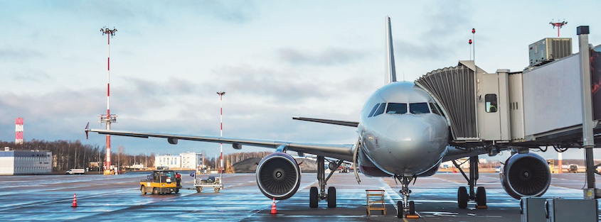 airplane boarding on tarmac